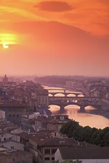 Europe, Italy, Tuscanny, Florence. Ponte Vecchio Bridge at sunset, viewed from Piazza Europe, Italy, Tuscanny, Florence. Ponte Vecchio Bridge at sunset, viewed from Piazza