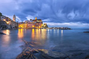 Europe, Italy, Vernazza. Sunset on coastal town Europe, Italy, Vernazza. Sunset on coastal town