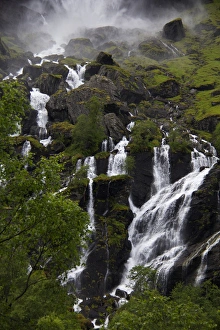 Europe, Norway, Flam. Lush waterfall in Flam, Norway Europe, Norway, Flam. Lush waterfall in Flam, Norway