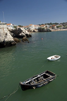 Europe, Portugal. Seaside city of Cascais, coastal view with rowboat Europe, Portugal. Seaside city of Cascais, coastal view with rowboat