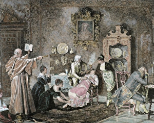 Exorcism. Cleric doing a spell against the evil spirit. Engraving by Recorded by C Exorcism. Cleric doing a spell against the evil spirit. Engraving by Recorded by C