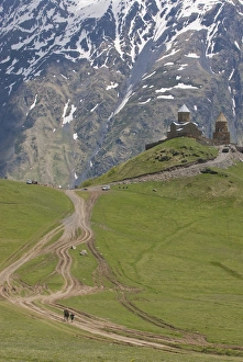 Famous Holy Trinity Church (Tsminda Sameba) from 14th century near Gergeti village Famous Holy Trinity Church (Tsminda Sameba) from 14th century near Gergeti village
