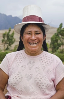 Farming portrait of woman smiling on farm in small town of Chinchero Peru South America Farming portrait of woman smiling on farm in small town of Chinchero Peru South America