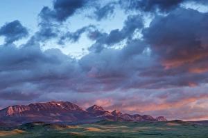 Fiery sunrise light strike Choteau Mountain along the Rocky Mountain Front near Choteau Fiery sunrise light strike Choteau Mountain along the Rocky Mountain Front near Choteau