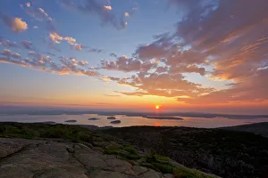 The first sunlight to strike the eastern USA from Cadillac Mountain in Acadia National The first sunlight to strike the eastern USA from Cadillac Mountain in Acadia National