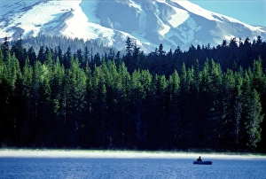 Fishing from a raft on Frog Lake in the Mt Hood National Forest Fishing from a raft on Frog Lake in the Mt Hood National Forest