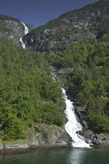 Fjord waterfall Aurland fjord / Naeroy Fjord between Flam and Gudvagan is situated Fjord waterfall Aurland fjord / Naeroy Fjord between Flam and Gudvagan is situated