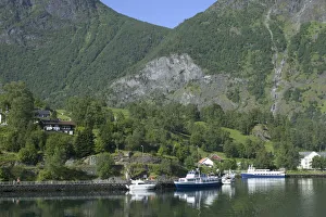 Flam; situated in the innermost part of the Sognefjord surrounded by high mountains Flam; situated in the innermost part of the Sognefjord surrounded by high mountains