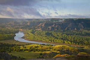 Fog burns off at sunrise from River Bend Overlook in the North Unit of Theodore Roosevelt Fog burns off at sunrise from River Bend Overlook in the North Unit of Theodore Roosevelt