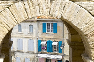 France, Arles, Roman Amphitheater arch and typical French window scene France, Arles, Roman Amphitheater arch and typical French window scene