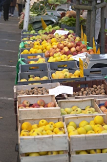 Fruits, apples and vegetables for sale at a market stall at the market in Bergerac Fruits, apples and vegetables for sale at a market stall at the market in Bergerac
