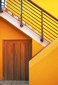 Geometric view of a yellow and orange stairway Geometric view of a yellow and orange stairway
