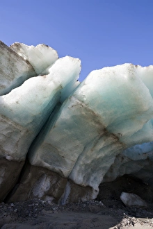 Glacier snout of Schlatenkees. The ice shows layers, shearmarks and moraine debris Glacier snout of Schlatenkees. The ice shows layers, shearmarks and moraine debris