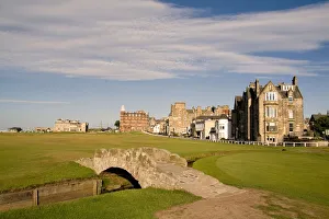 Golfing the special Swilcan Bridge on the 18th hole at the world famous St Andrews Golfing the special Swilcan Bridge on the 18th hole at the world famous St Andrews