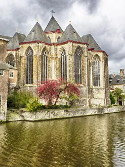 Gothic Saint Michaels Church beside Leie River Gothic Saint Michaels Church beside Leie River