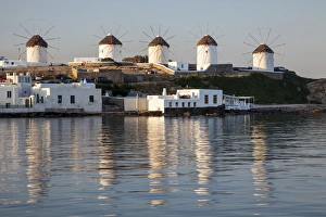 Greece, Mykonos, Sindmills and Their Reflection in the Water Greece, Mykonos, Sindmills and Their Reflection in the Water