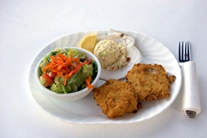 Haddock fish dinner served in restaurant at Halls Harbor, Nova Scotia, Canada Haddock fish dinner served in restaurant at Halls Harbor, Nova Scotia, Canada