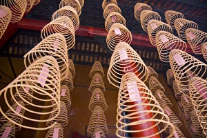 Hanging incence with prayer offerings hanging inside, Chinese Temple, Kuala Lumpur Hanging incence with prayer offerings hanging inside, Chinese Temple, Kuala Lumpur