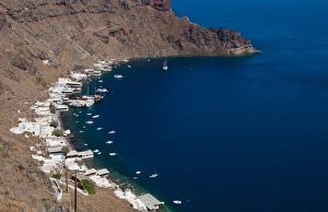 Harbor with boats in isolated village of Thirassia across from Santorini Greece in Harbor with boats in isolated village of Thirassia across from Santorini Greece in