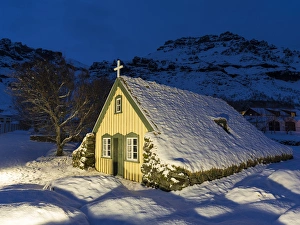 Hofskirkja, the historic church of village Hof near Vatnajoekull NP during winter Hofskirkja, the historic church of village Hof near Vatnajoekull NP during winter