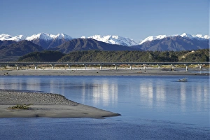Hokitika River and Southern Alps, West Coast, South Island, New Zealand Hokitika River and Southern Alps, West Coast, South Island, New Zealand