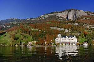 Hotel in autum along shore of Lake Lucerne from sightseeing boat, Lake Lucerne Hotel in autum along shore of Lake Lucerne from sightseeing boat, Lake Lucerne