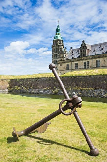 Huge old anchor before the Unesco world heritage sight Kronborg renaissance castle Huge old anchor before the Unesco world heritage sight Kronborg renaissance castle