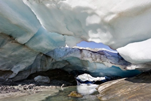 Ice cave and glacier snout of Schlatenkees, source of the creek Schlatenbach Ice cave and glacier snout of Schlatenkees, source of the creek Schlatenbach