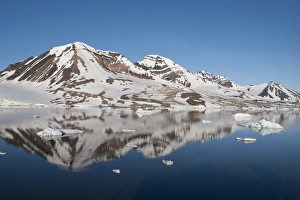 Icebergs and mountains , Hornsund Fiord, on the western side of the southernmost Icebergs and mountains , Hornsund Fiord, on the western side of the southernmost
