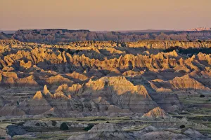 illuminated buttes, sunrise, Pinnacles Viewpoint, Badlands National Park, South Dakota illuminated buttes, sunrise, Pinnacles Viewpoint, Badlands National Park, South Dakota