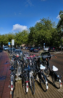 The importance of bicycles on a sunny day in Amsterdam, the Netherlands The importance of bicycles on a sunny day in Amsterdam, the Netherlands