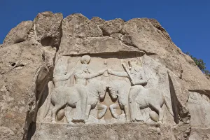 Iran, Central Iran, Shiraz, Naqsh-e Rostam, Sassanian stone reliefs cut into mountain Iran, Central Iran, Shiraz, Naqsh-e Rostam, Sassanian stone reliefs cut into mountain