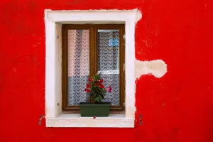 Italy, Burano. Colorful house wall and window Italy, Burano. Colorful house wall and window