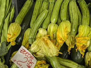 Italy, Florence. Zucchini with flowers for sale in the Central Market Italy, Florence. Zucchini with flowers for sale in the Central Market