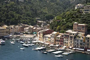 Italy, Genoa province, Portofino. Upscale fishing village on the Ligurian Sea, pastel Italy, Genoa province, Portofino. Upscale fishing village on the Ligurian Sea, pastel