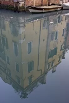 Images Dated 19th March 2005: Italy, Venice. Building and boat reflected in still canal
