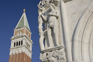 Italy, Venice. Corner statue of Doges Palace and Campanile Italy, Venice. Corner statue of Doges Palace and Campanile
