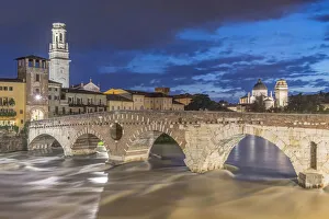 Italy, Verona. Ponte Pietra (Roman Bridge) at Twilight Italy, Verona. Ponte Pietra (Roman Bridge) at Twilight