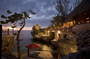 Jamaica, Negril, Rockhouse Hotel at dusk along Caribbean Sea Jamaica, Negril, Rockhouse Hotel at dusk along Caribbean Sea