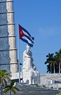 Jose Marti Statue flag and monument at Revoltution Square in Havana Habana Cuba Jose Marti Statue flag and monument at Revoltution Square in Havana Habana Cuba