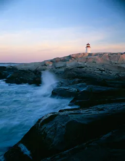 The lightouse at Peggys Cove along the granite shoreline of southern Nova Scotia, Canada The lightouse at Peggys Cove along the granite shoreline of southern Nova Scotia, Canada