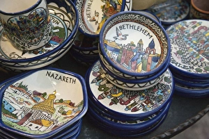 Local ceramic ware with Biblical themes on Nazareth, Israel sidewalk Local ceramic ware with Biblical themes on Nazareth, Israel sidewalk