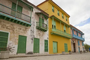 Local colorful streets and building architecture in Old Havana, Cuba Local colorful streets and building architecture in Old Havana, Cuba