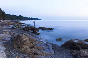 Long exposure of a transparent image of woman on the beach in Sechelt, British Columbia Long exposure of a transparent image of woman on the beach in Sechelt, British Columbia
