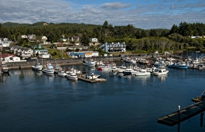 Looking down from above at Depoe Bay Oregon harbor with scenic colorful boats in pier Looking down from above at Depoe Bay Oregon harbor with scenic colorful boats in pier