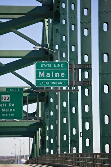 Maine state line sign on the Piscataqua River bridge. I-95. Between Kittery, Maine and Portsmouth Maine state line sign on the Piscataqua River bridge. I-95. Between Kittery, Maine and Portsmouth