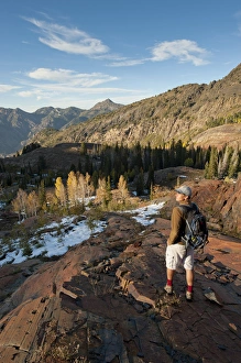 Man hiking above Lake Lillian and Florence, Uintah-Wasatch -Cache National Forest Man hiking above Lake Lillian and Florence, Uintah-Wasatch -Cache National Forest