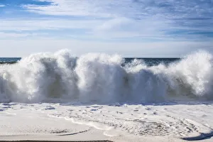 Massive breaking wave on a beach in northern California Massive breaking wave on a beach in northern California