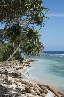 Melanesia, Papua New Guinea, Bismarck Sea, Tuam Island. Scenic view of island coastline Melanesia, Papua New Guinea, Bismarck Sea, Tuam Island. Scenic view of island coastline