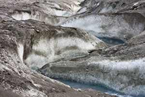 meltwater channel and creek on the surface of glacier Pasterze near Grossglockner meltwater channel and creek on the surface of glacier Pasterze near Grossglockner